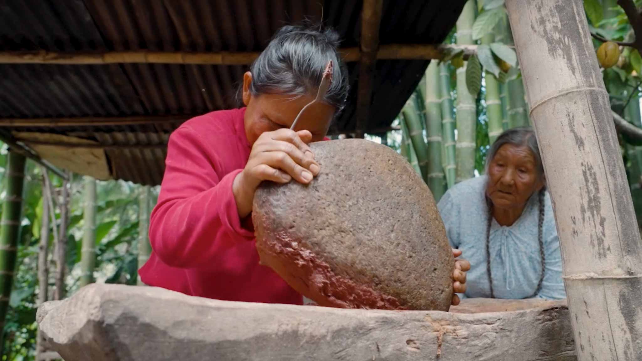 Stone-grinding by hand