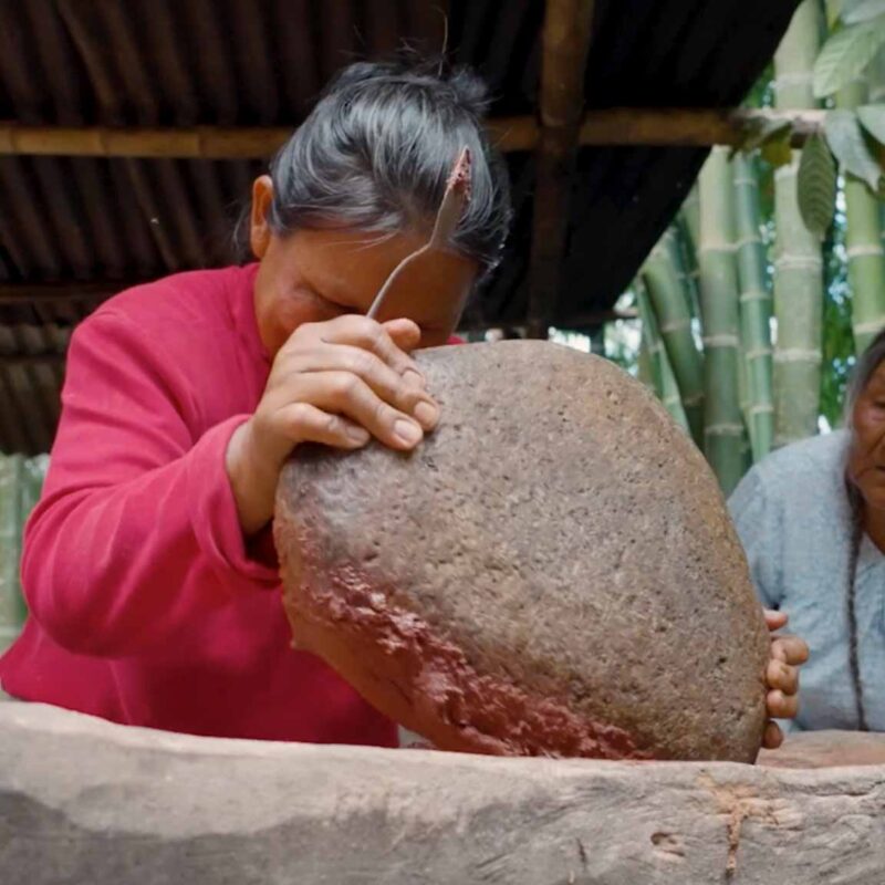 Stone-grinding by hand
