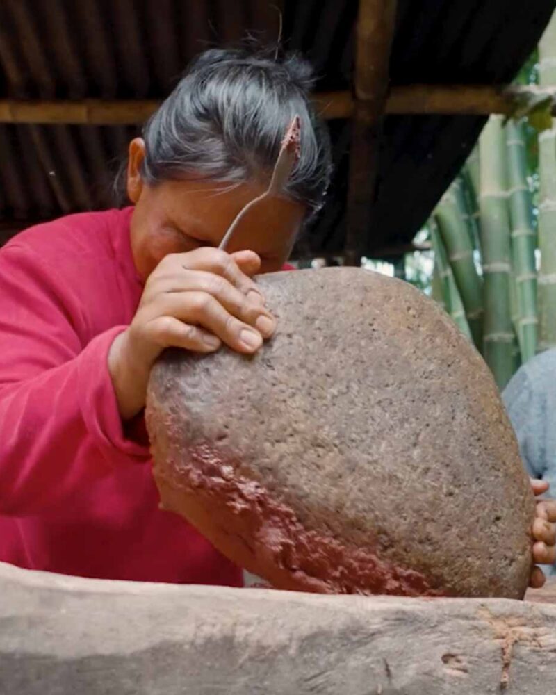 Stone-grinding by hand